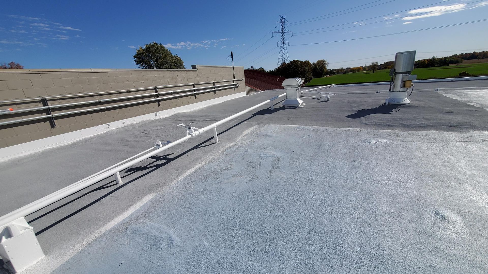 A roof with a lot of wires on it