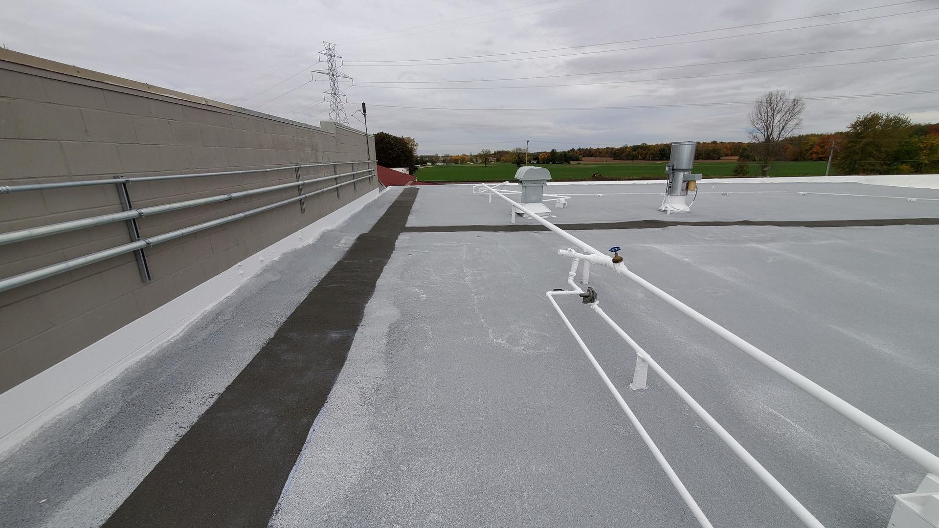 A roof with a lot of wires on it