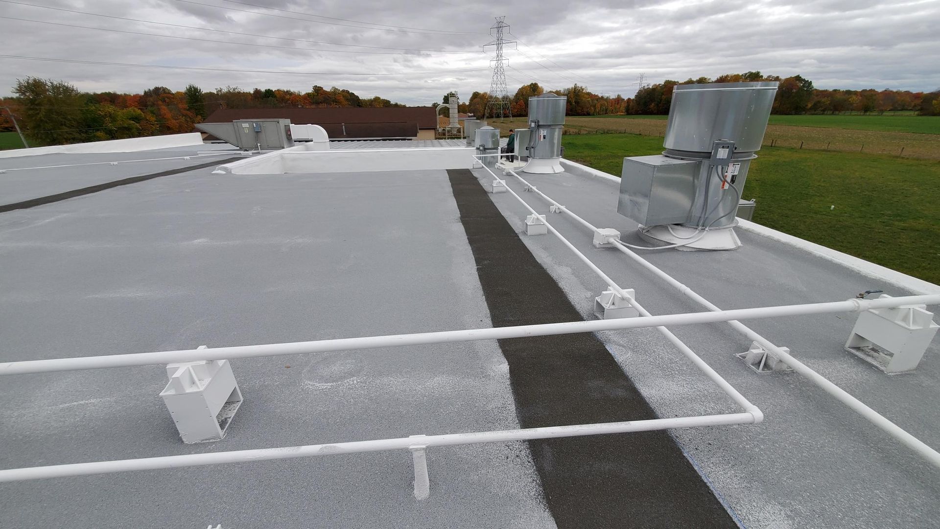 A roof with a lot of wires on it