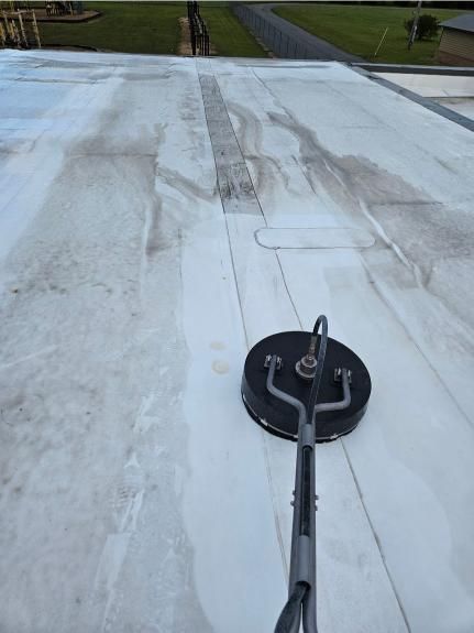 A white roof with a black object on it