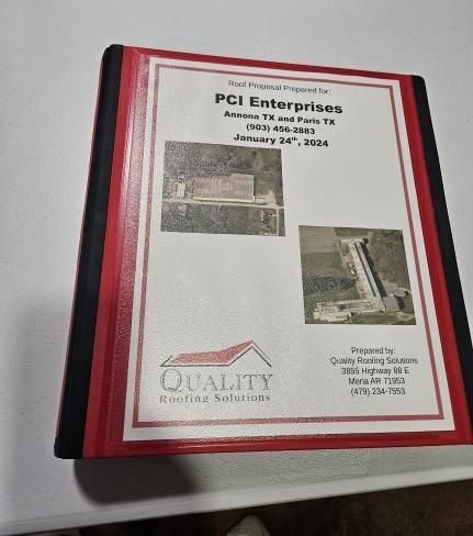 A book titled pci enterprises is sitting on a table