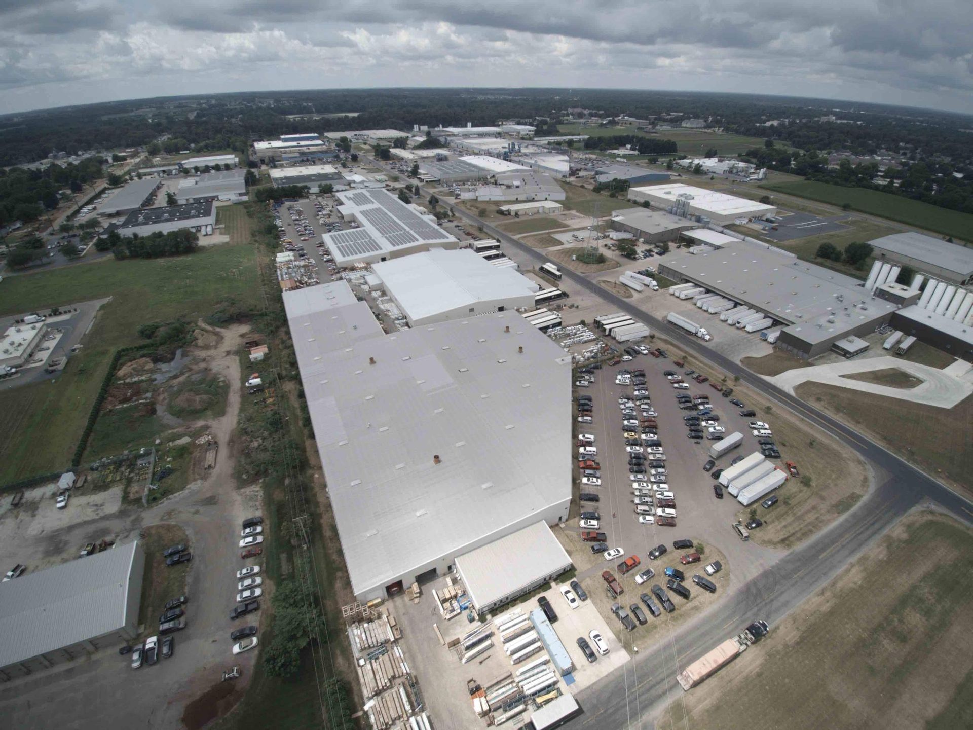 An aerial view of a large industrial area with lots of buildings