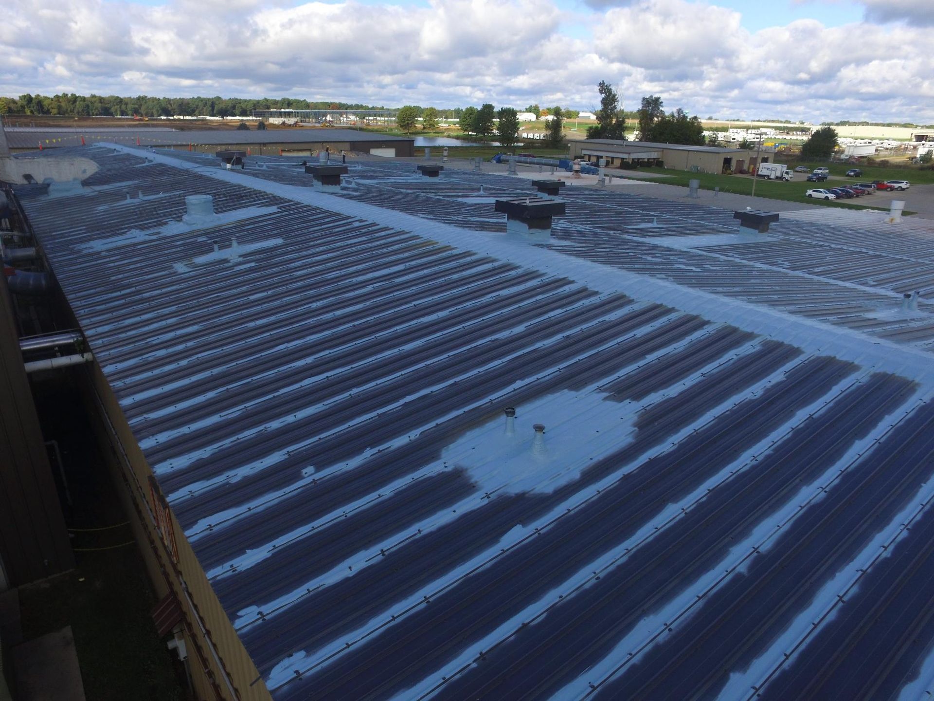An aerial view of a roof with a lot of holes in it.