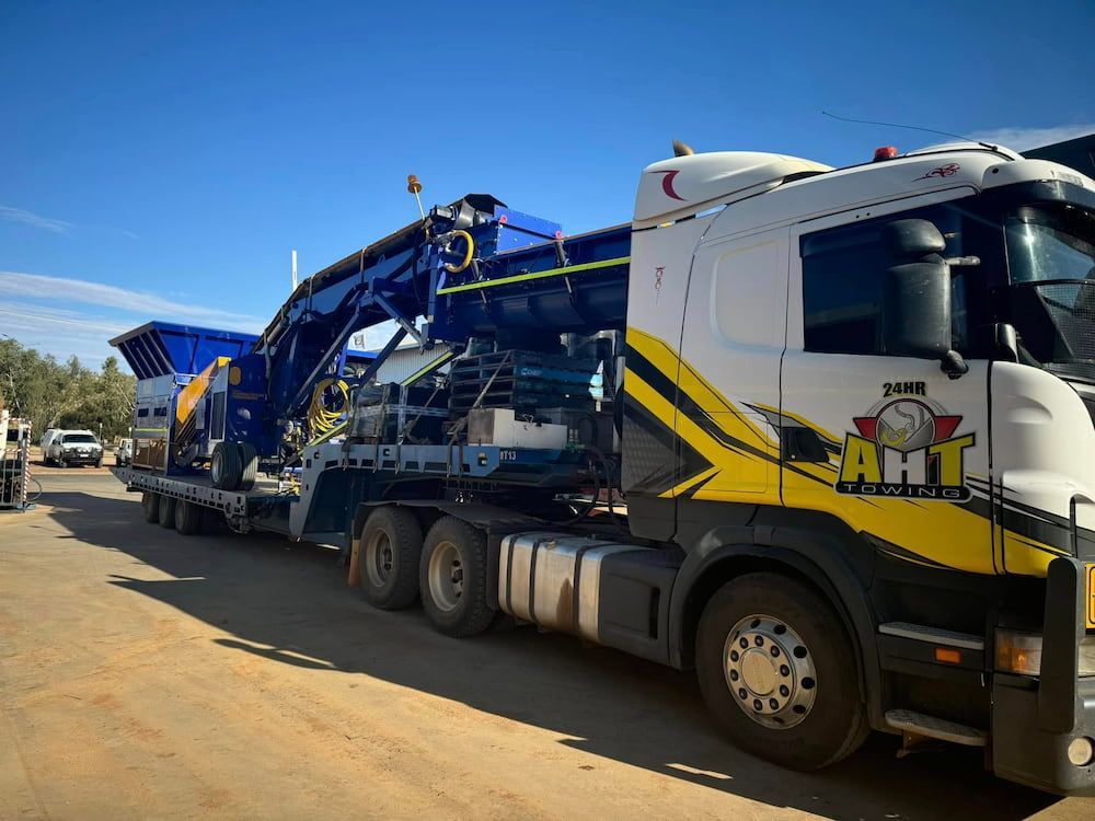 A White And Yellow Truck — AHT Towing in Ciccone, NT
