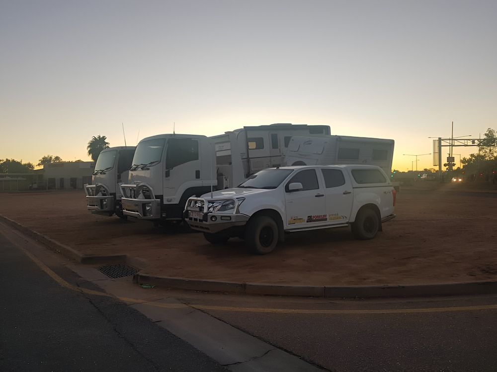 A Row Of Trucks Parked Next To Each Other — AHT Towing in Ciccone, NT