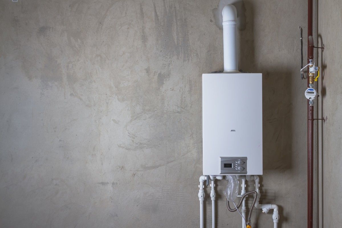 Tankless water heater on wall