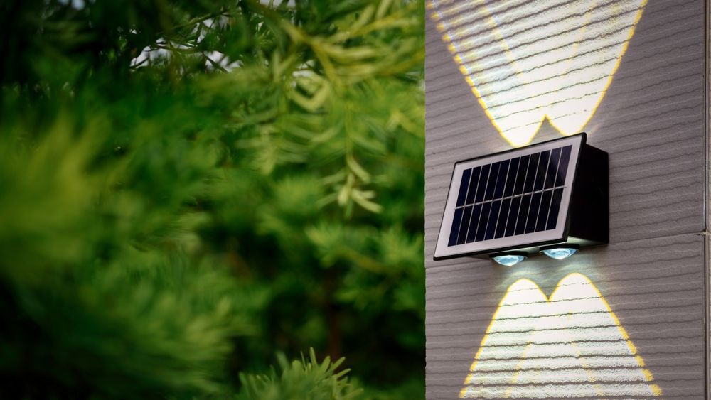 Solar-powered Wall Light Illuminates a Textured Wall — Mazlin Electrical Services Pty Ltd in Kirwan, QLD