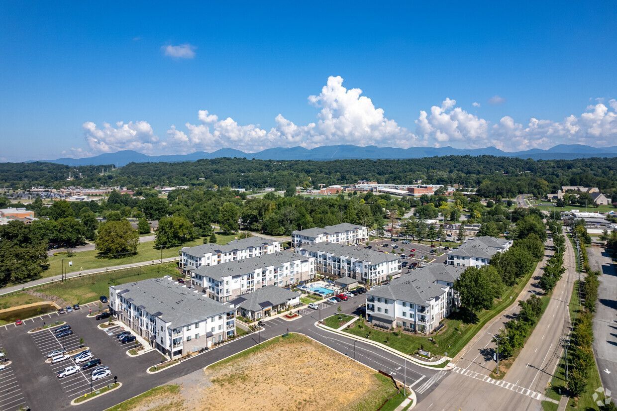 A large building under construction with cranes and scaffolding in Oak Ridge, TN.