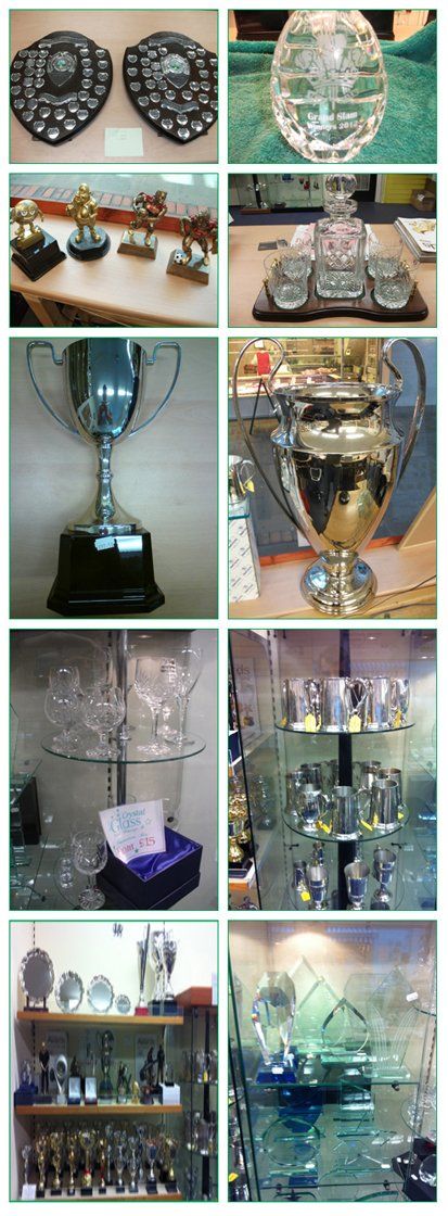 A selection of trophies in pewter, wood, silver and glass