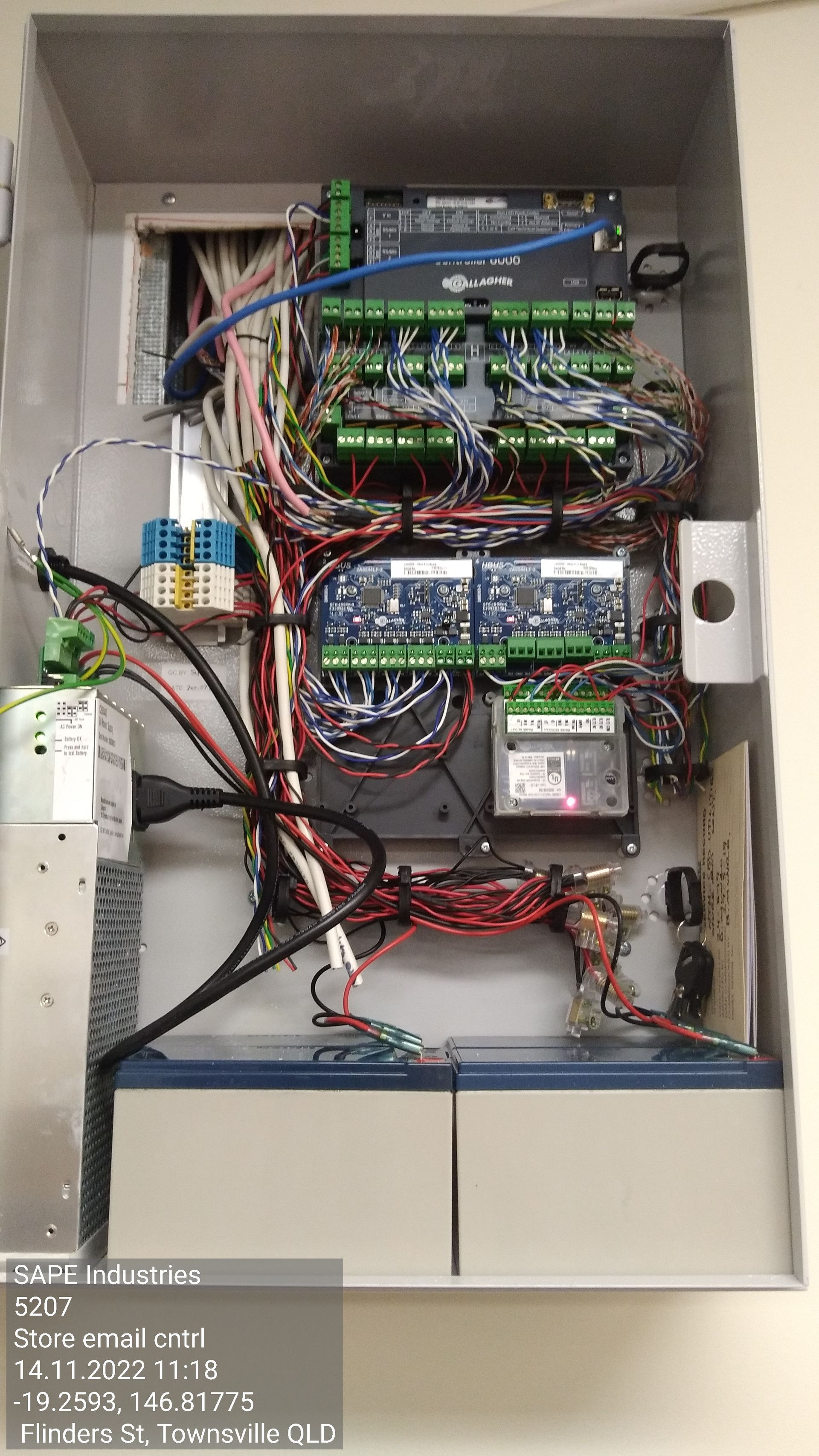 A box filled with lots of wires and electronics.