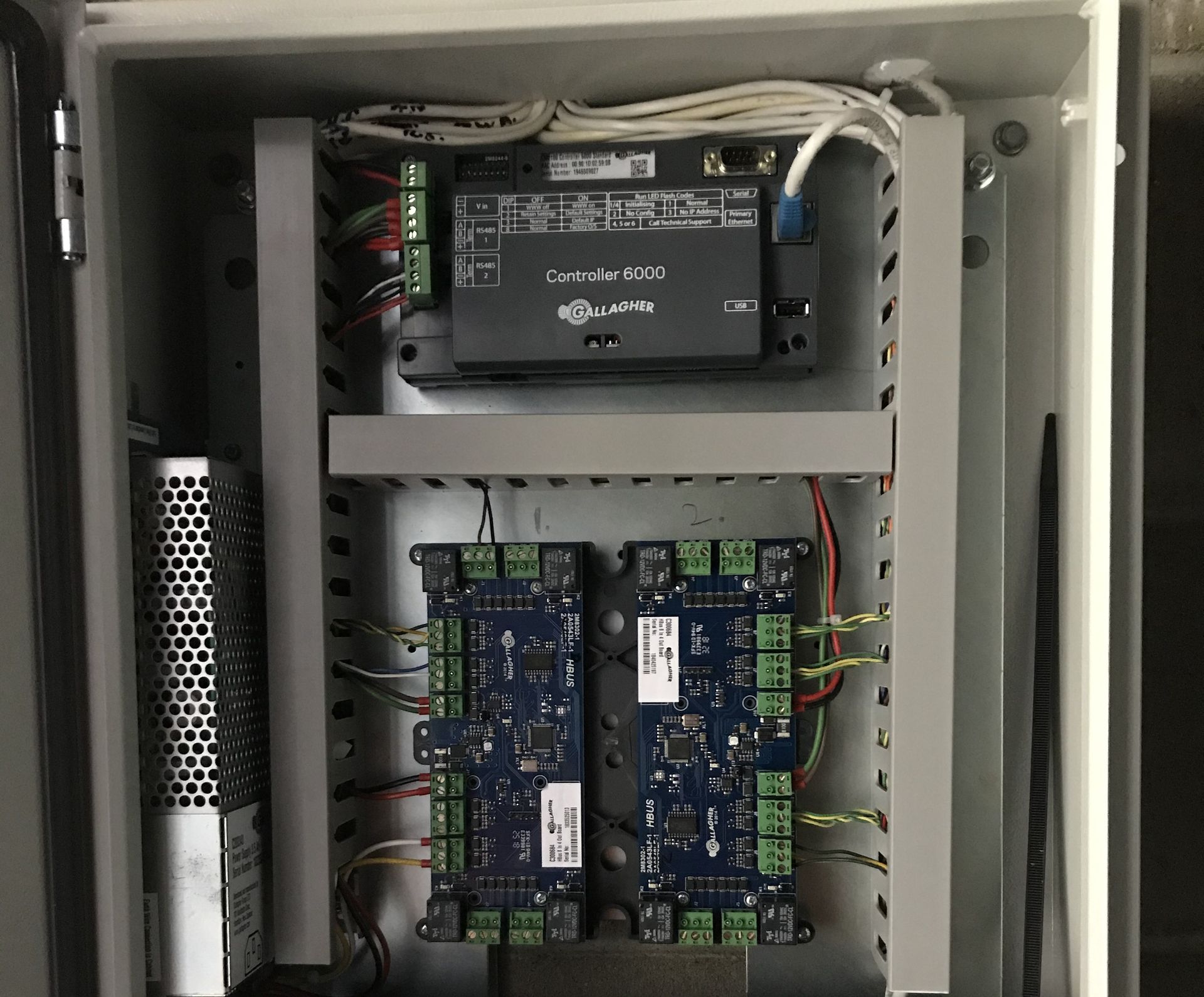 A box with a lot of wires coming out of it