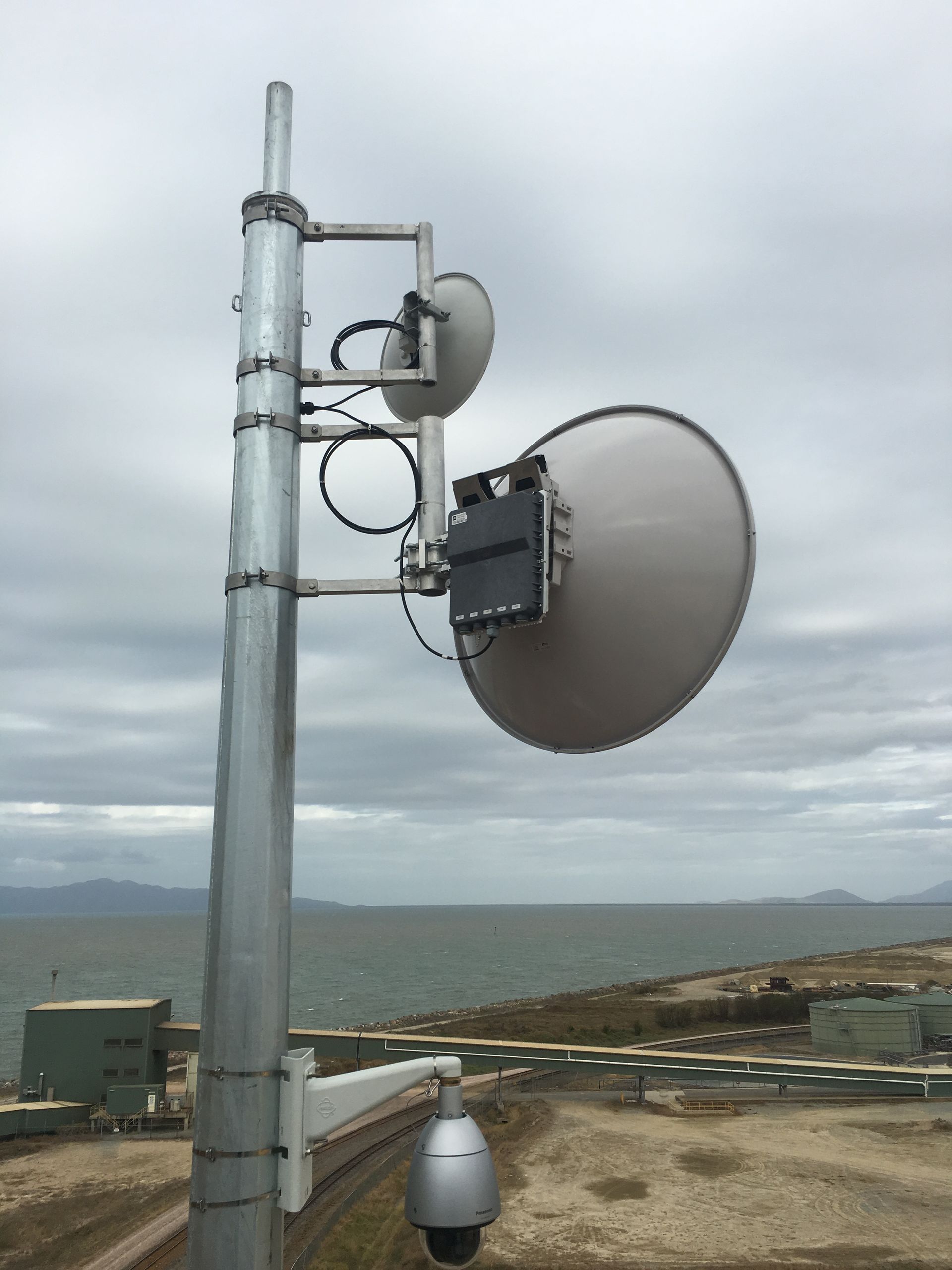 Man is Climbing Up the Side of a Tall Building — Sape Industries in Garbutt, QLD