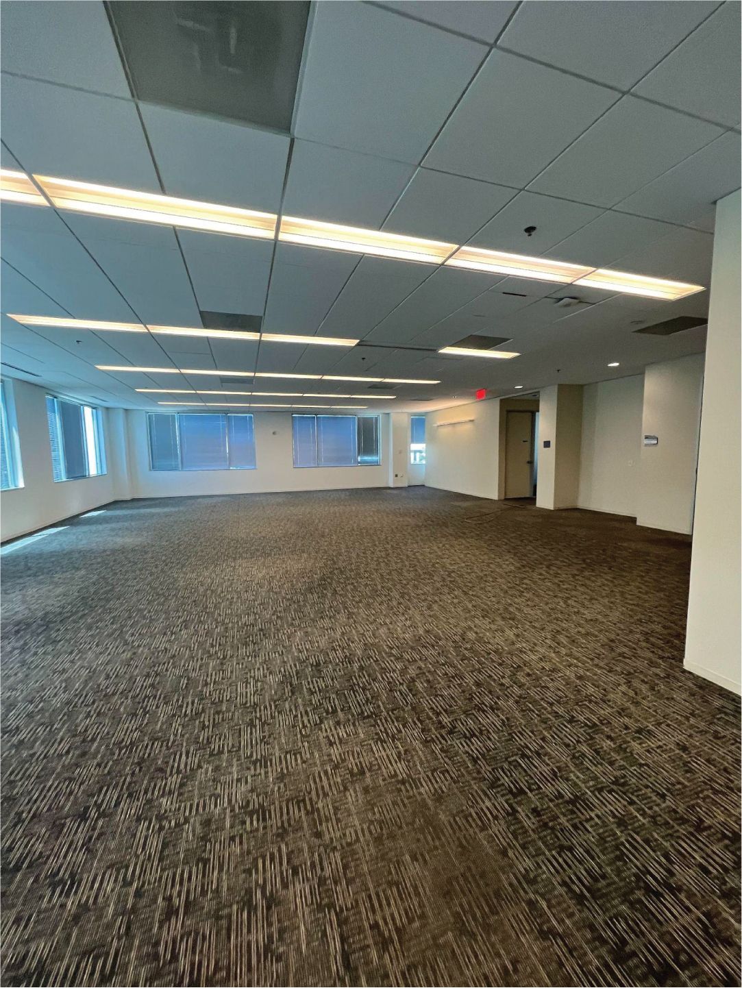 Man Connecting Cables in Server Cabinet