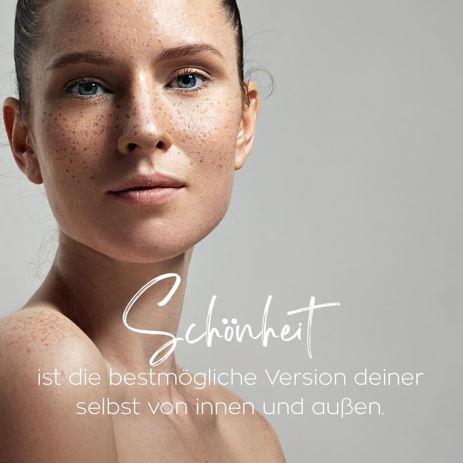 Eine Nahaufnahme eines Frauengesichts mit dem Text Schönheit