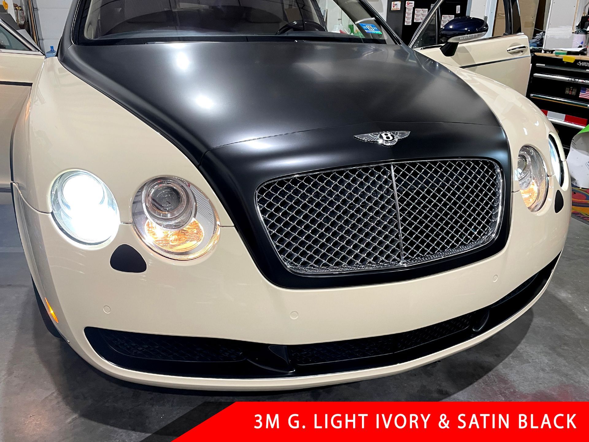 A bentley is wrapped in 3m g light ivory and satin black