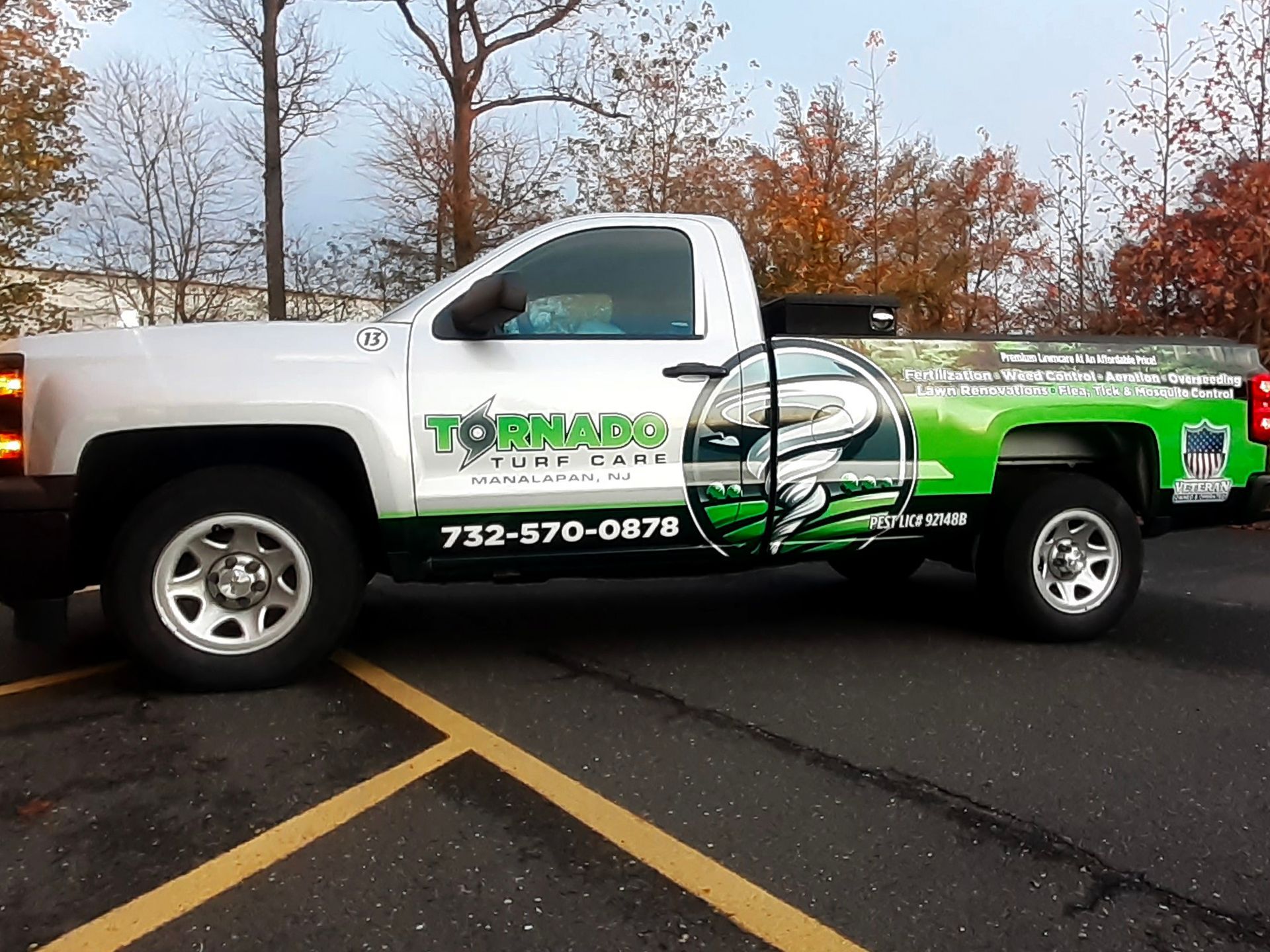 A tornado truck is parked in a parking lot