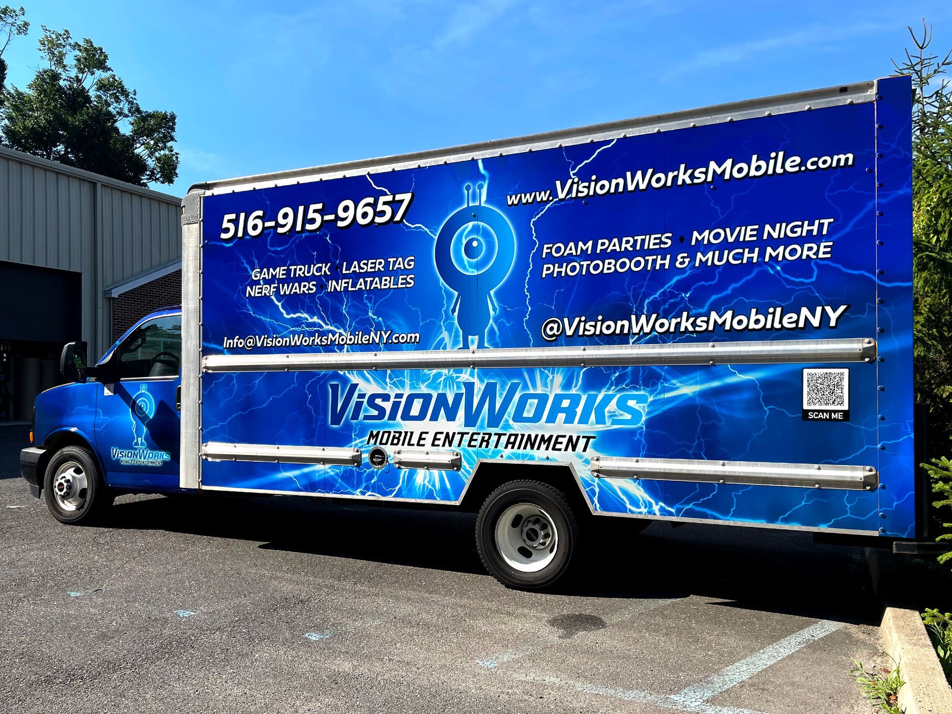 A blue van with the word vision on it