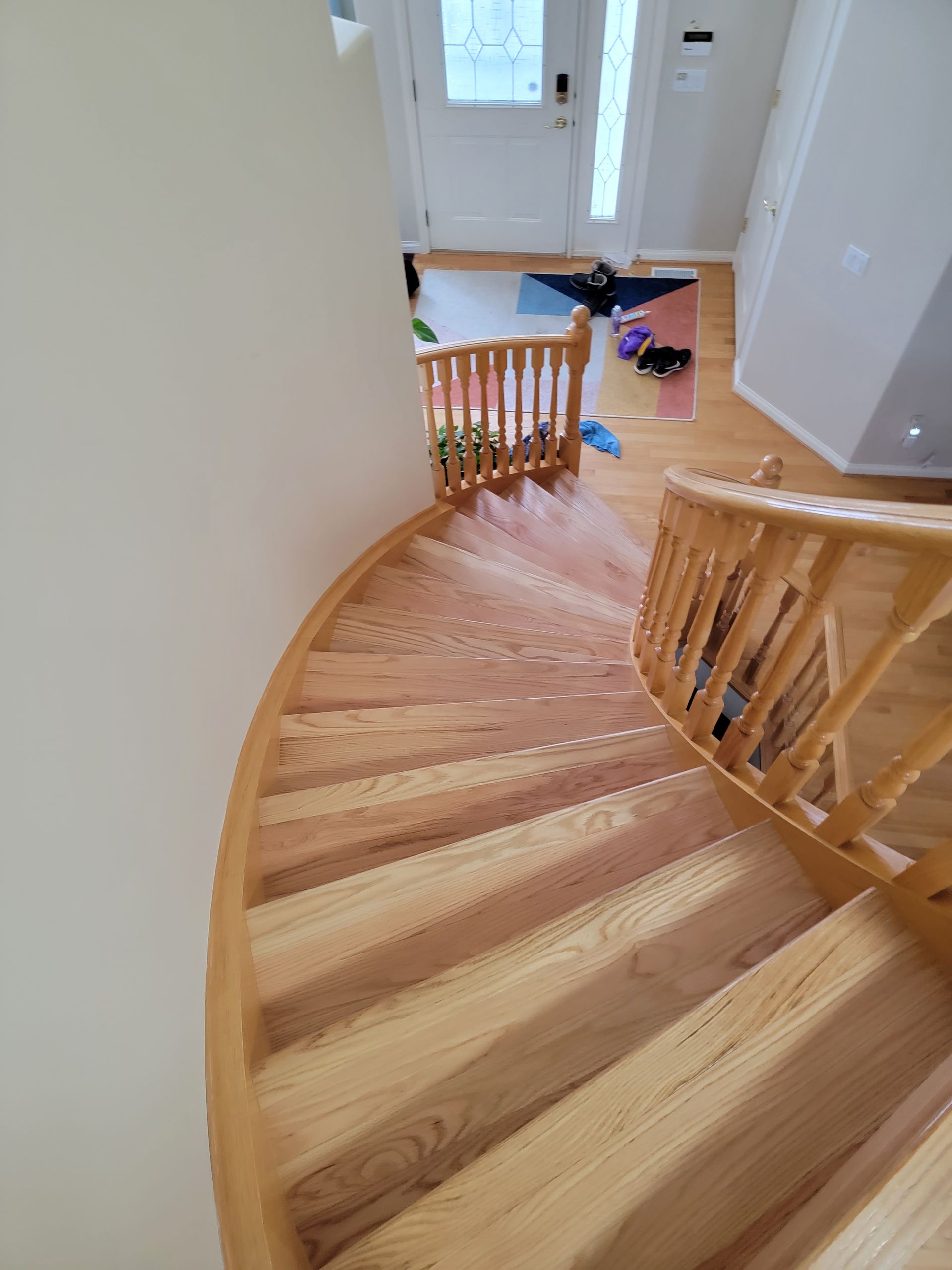 Curved Staircase — Balzac, AB — Brooklyn Interiors Inc