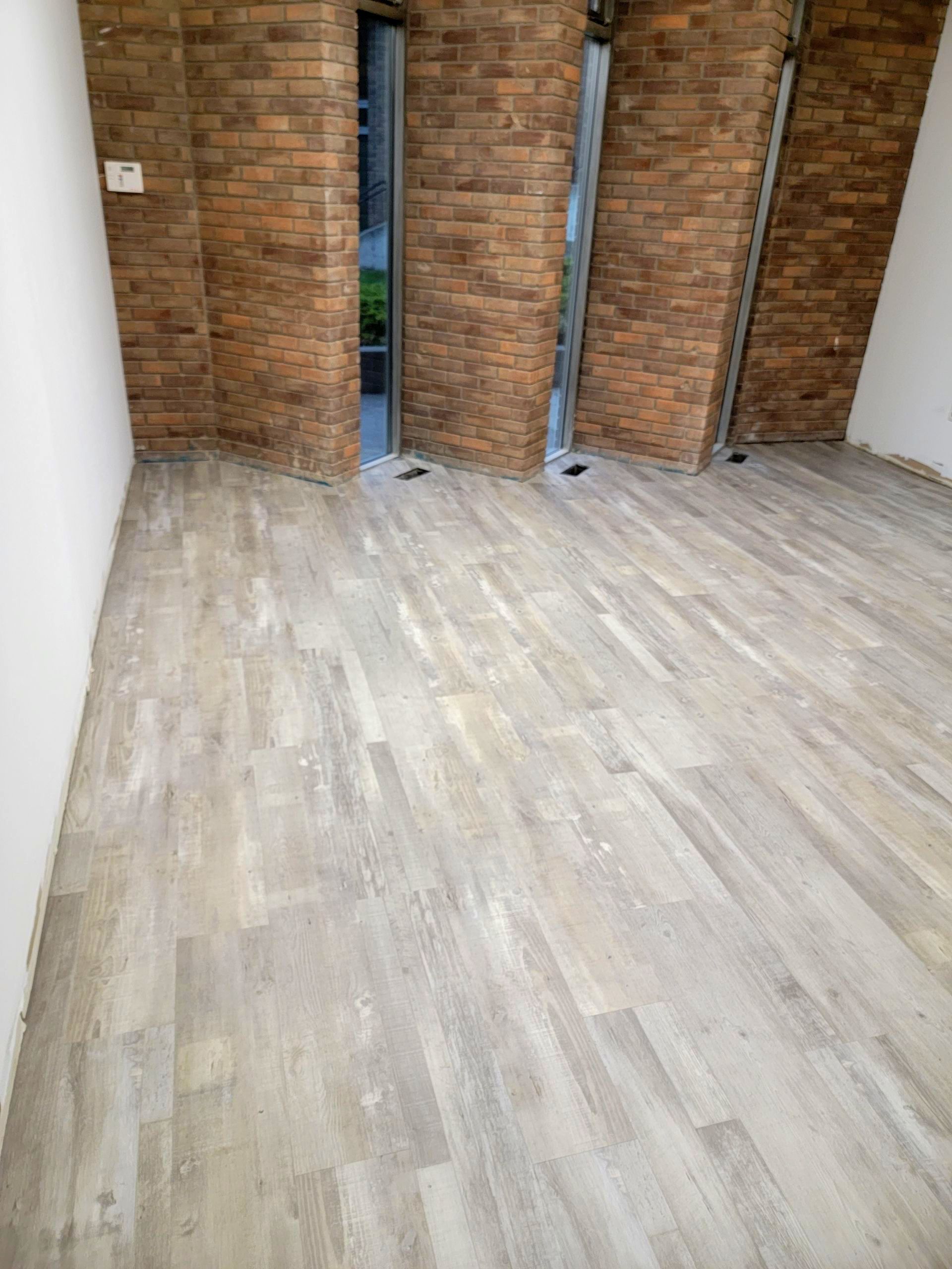 Brick Walls And New Flooring — Balzac, AB — Brooklyn Interiors Inc