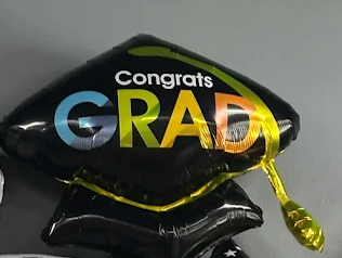 Black graduation cap balloon with