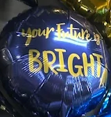 Blue and gold balloon reading “Your Future is BRIGHT”