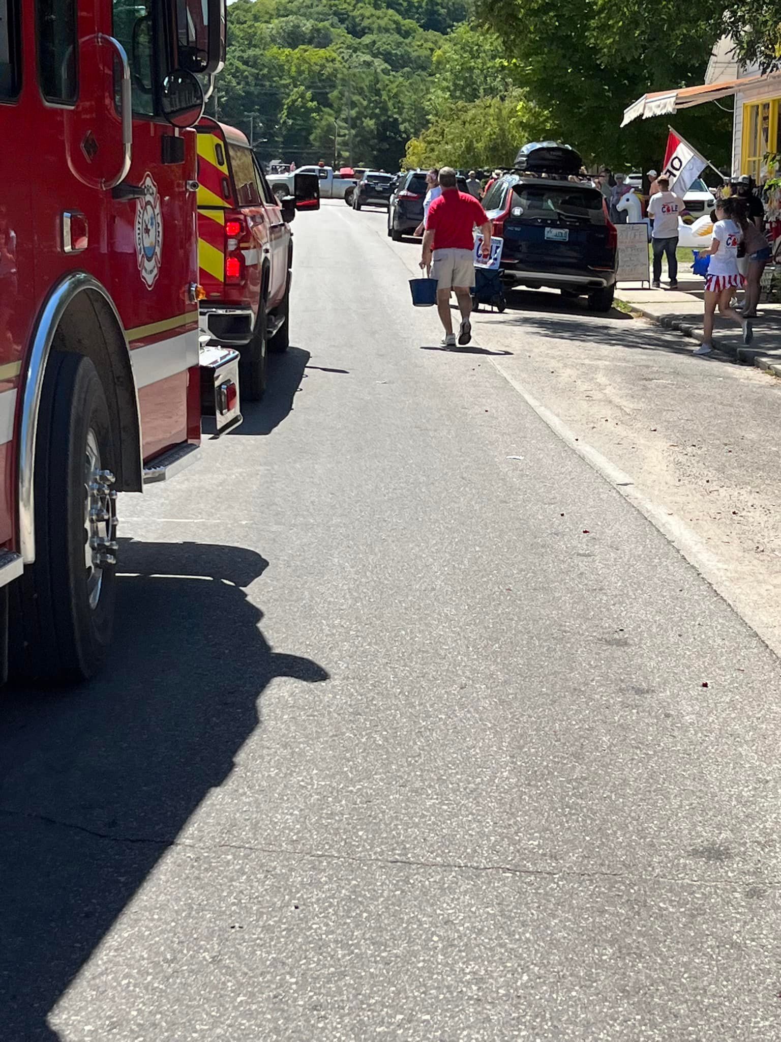 A fire truck is parked on the side of the road.