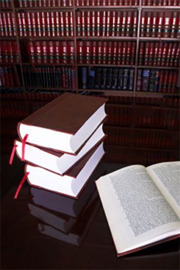 Legal library with law books on desk