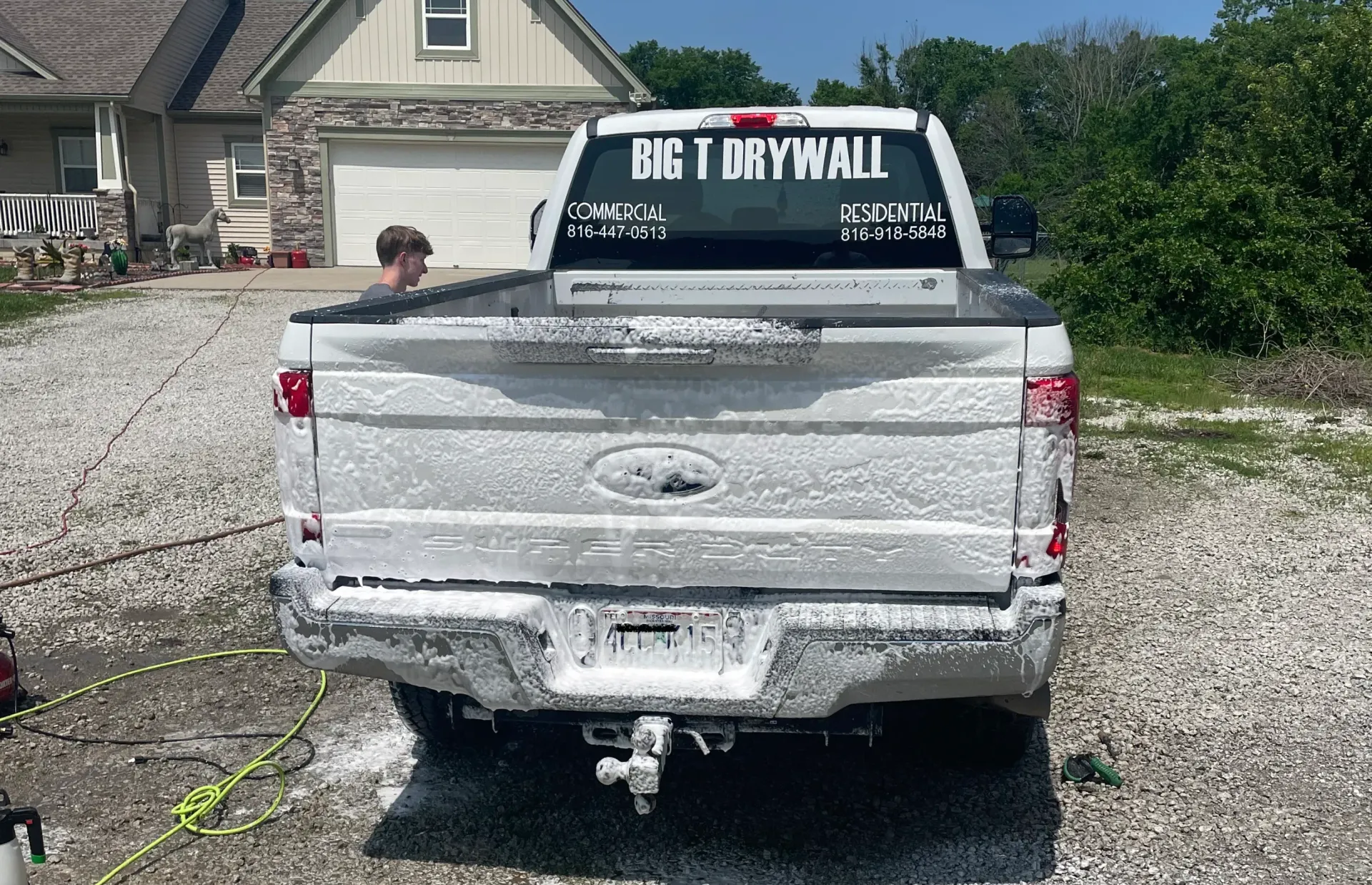 White truck getting an exterior detailing service by Smooth Auto Detailing.