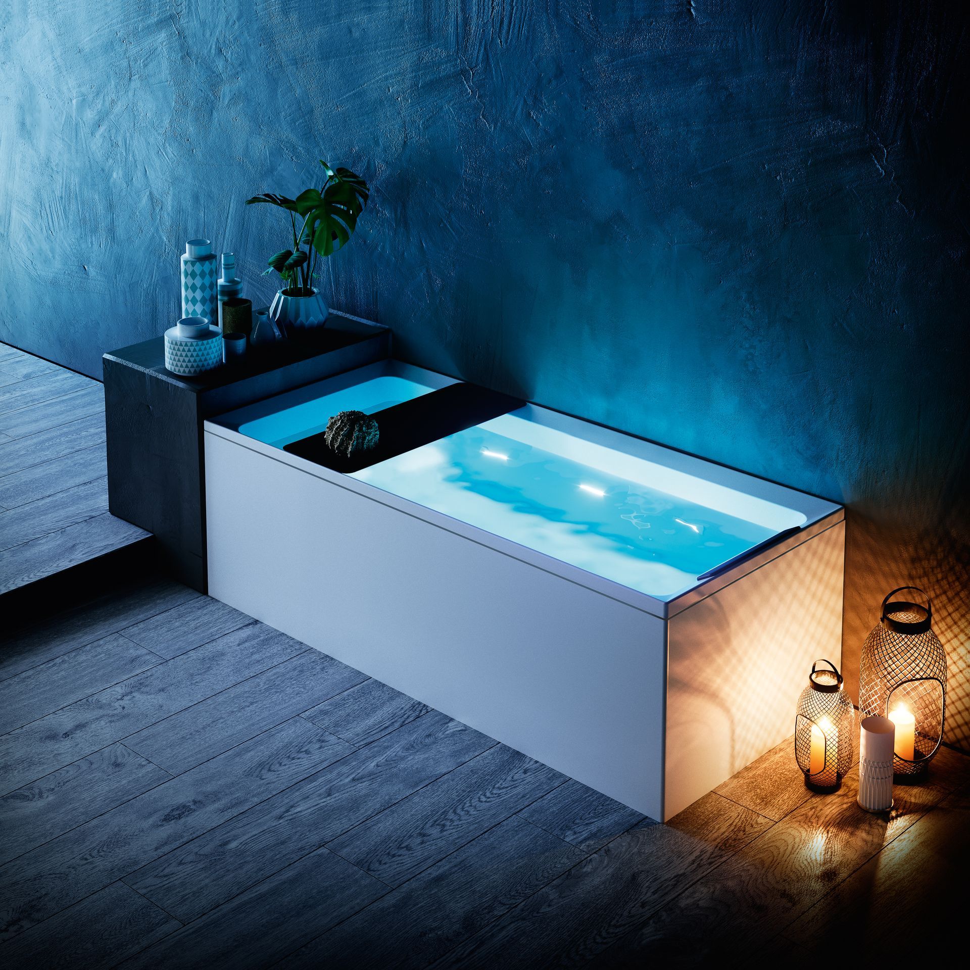 A bathtub in a bathroom with candles on the floor
