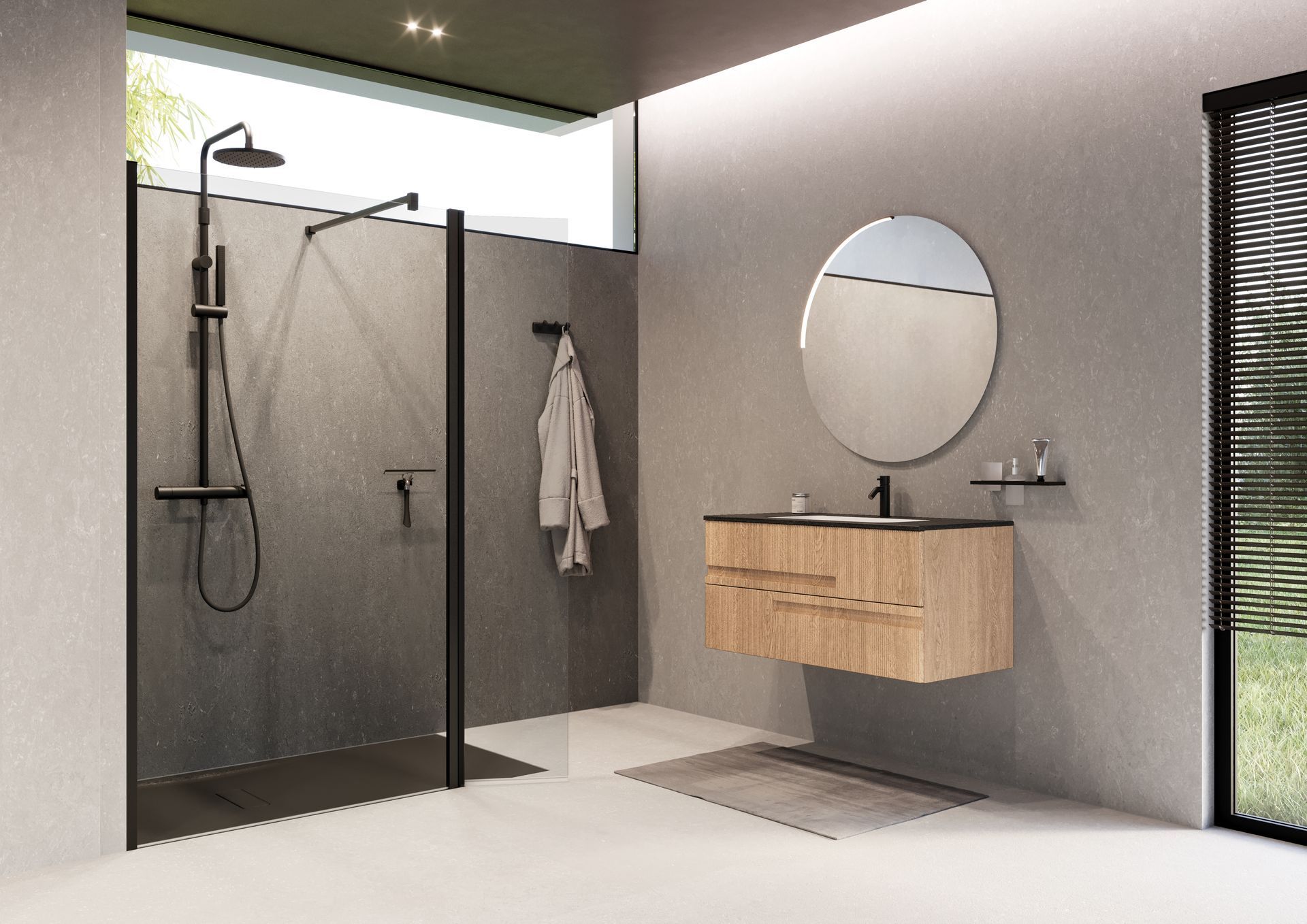 A bathroom with a walk in shower a sink and a mirror