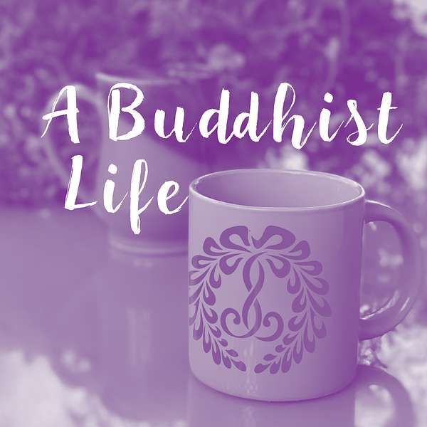 A purple mug that says a buddhist life on it