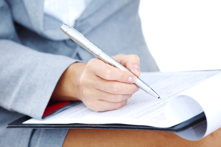 Woman Filling Up The Form — Evansville, IL — Permanent Makeup & More