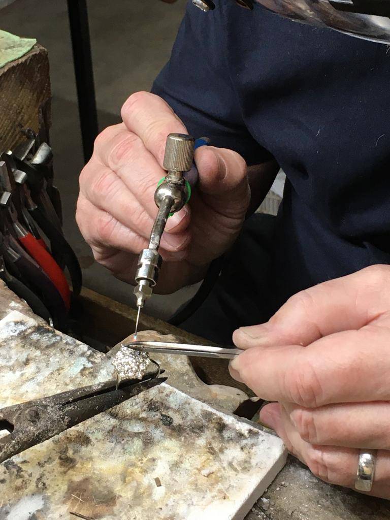 jeweler handles the jewelry