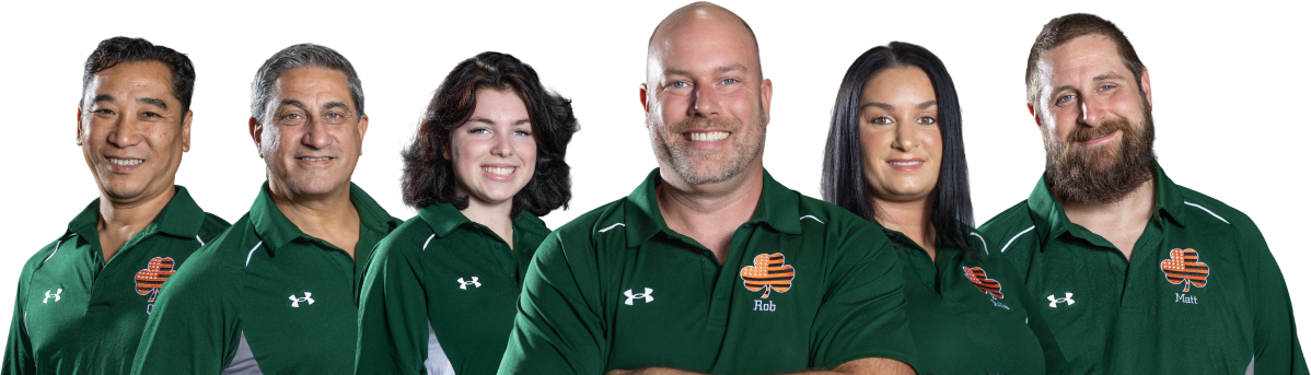 Group of people in green shirts, smiling. White background | Robert Warrens Automotive LLC