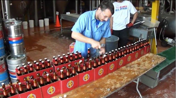 Most bottles opened in one minute: Benjamin Pilon sets world record (HD Video)