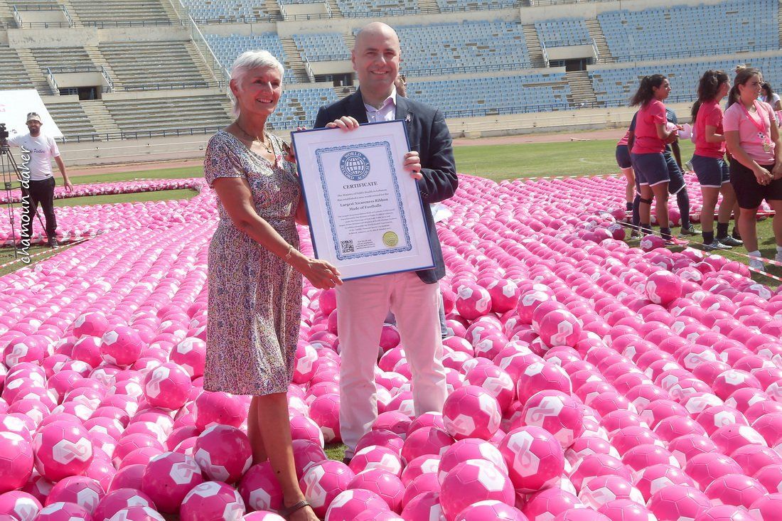 Largest Awareness Ribbon Made of Footballs WORLD RECORD
