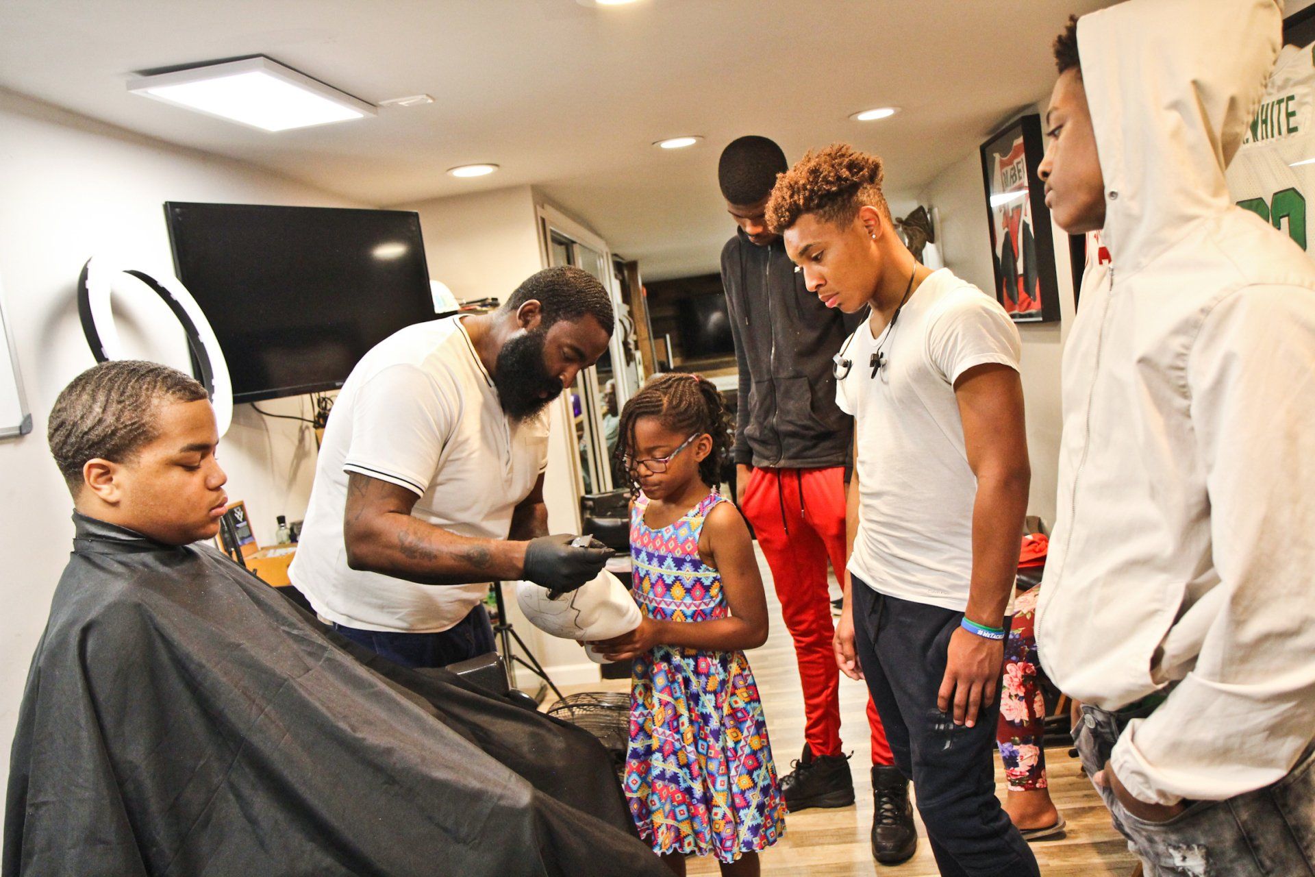 Junior Barbering Academy teaches kids the clips of the trade. Neijae Graham-Henries, 8, volunteers her services to the homeless in her community, setting the world record for being the World's Youngest Barber, according to the World Record Academy.