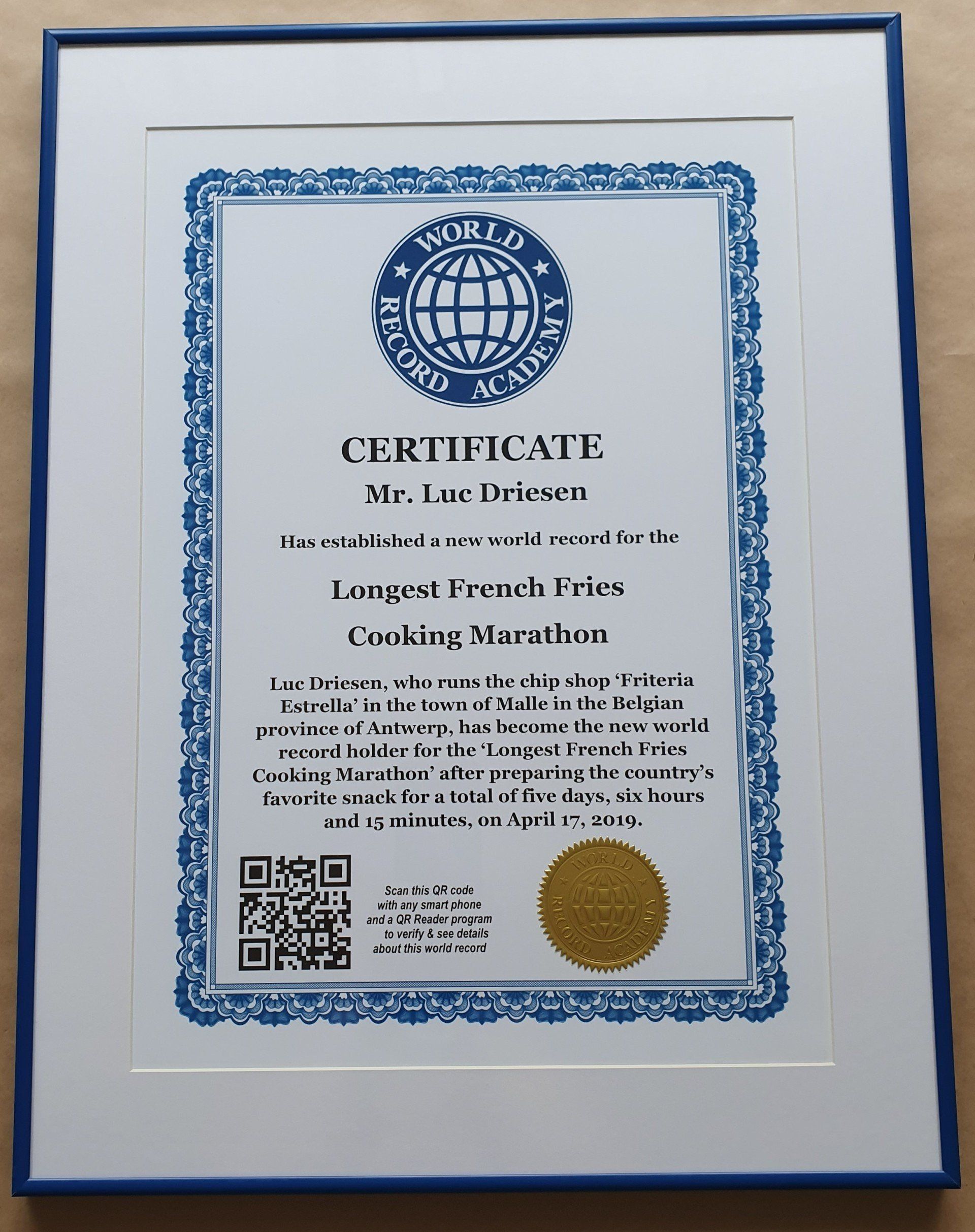  The world record certificate for the Longest French Fries Cooking Marathon.