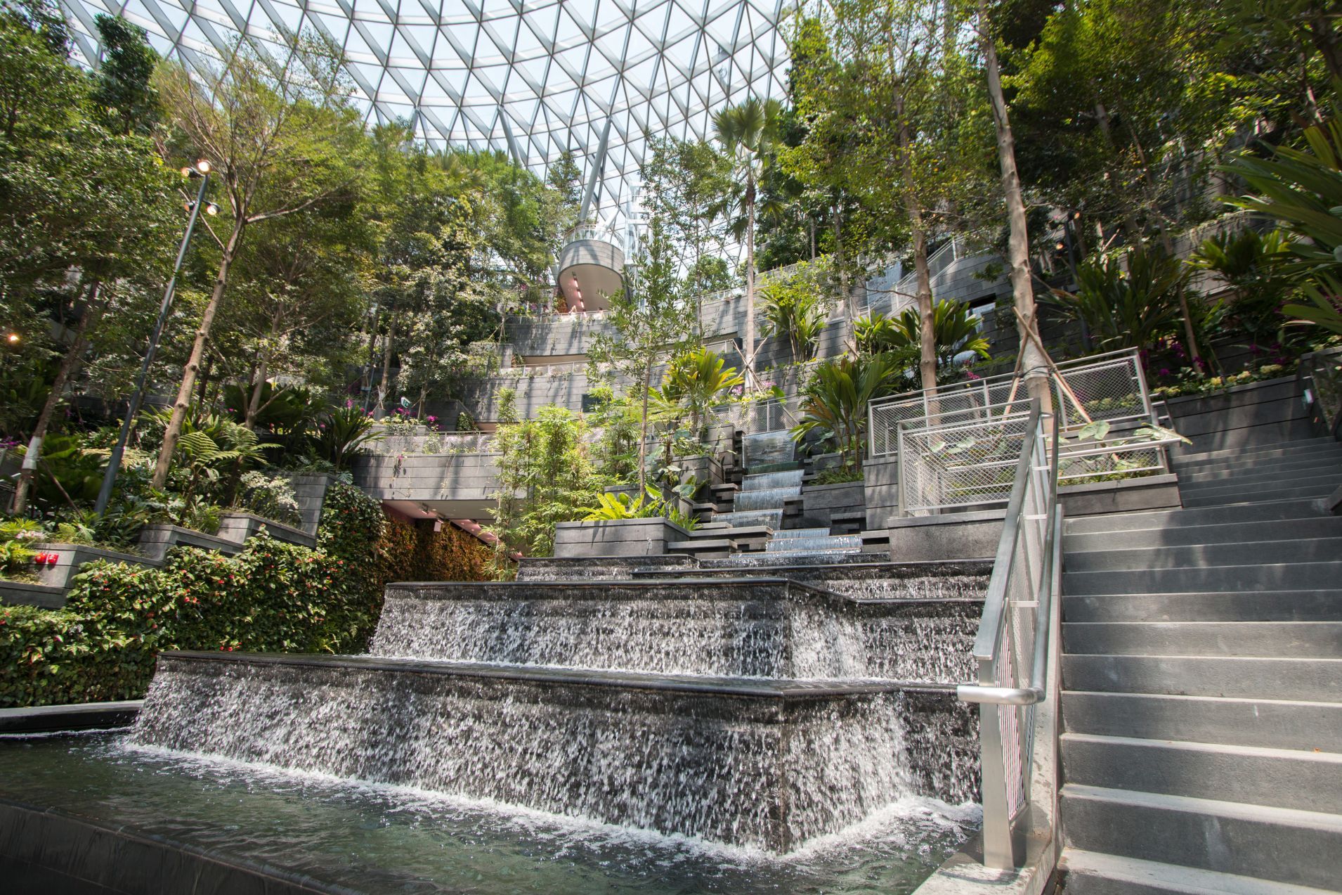  The Rain Vortex will pour rainwater down a seven-storey drop. The 40-metre-tall Rain Vortex – the world's tallest indoor waterfall – is the centrepiece of Singapore's soon-to-open Jewel Changi Airport, designed by Moshe Safdie's architecture firm. 