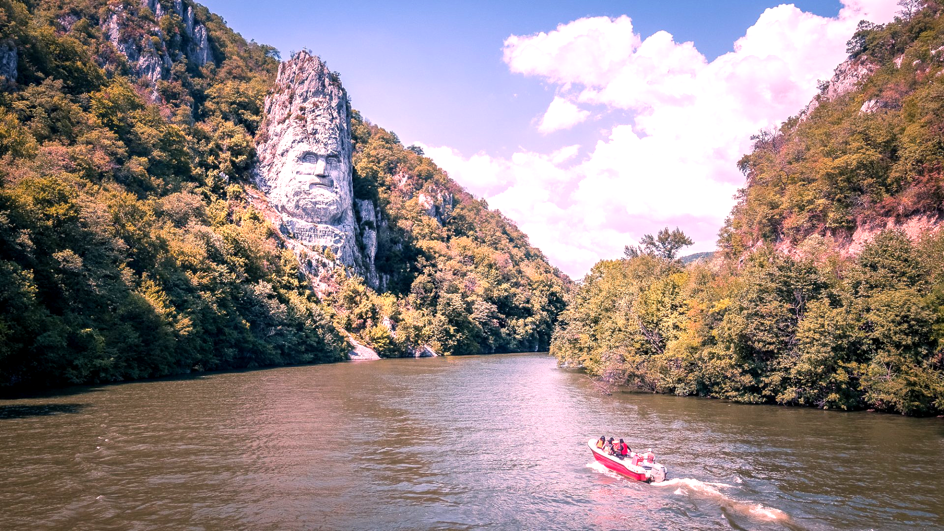 The rock sculpture of  Decebalus (Romanian: Chipul regelui dac Decebal) is a 42.9 m (141 ft) in height and 31.6 m (104 ft) in width carving in rock of the face of Decebalus (r. AD 87–106), the last king of Dacia, who fought against the Roman emperors Domitian and Trajan to preserve the independence of his country, which corresponded to modern Romania; it was  made between 1994 and 2004, on a rocky outcrop on the river Danube, at the Iron Gates, and sets the world record for being the World's Largest rock sculpture on a river's bank, according to the World Record Academy.