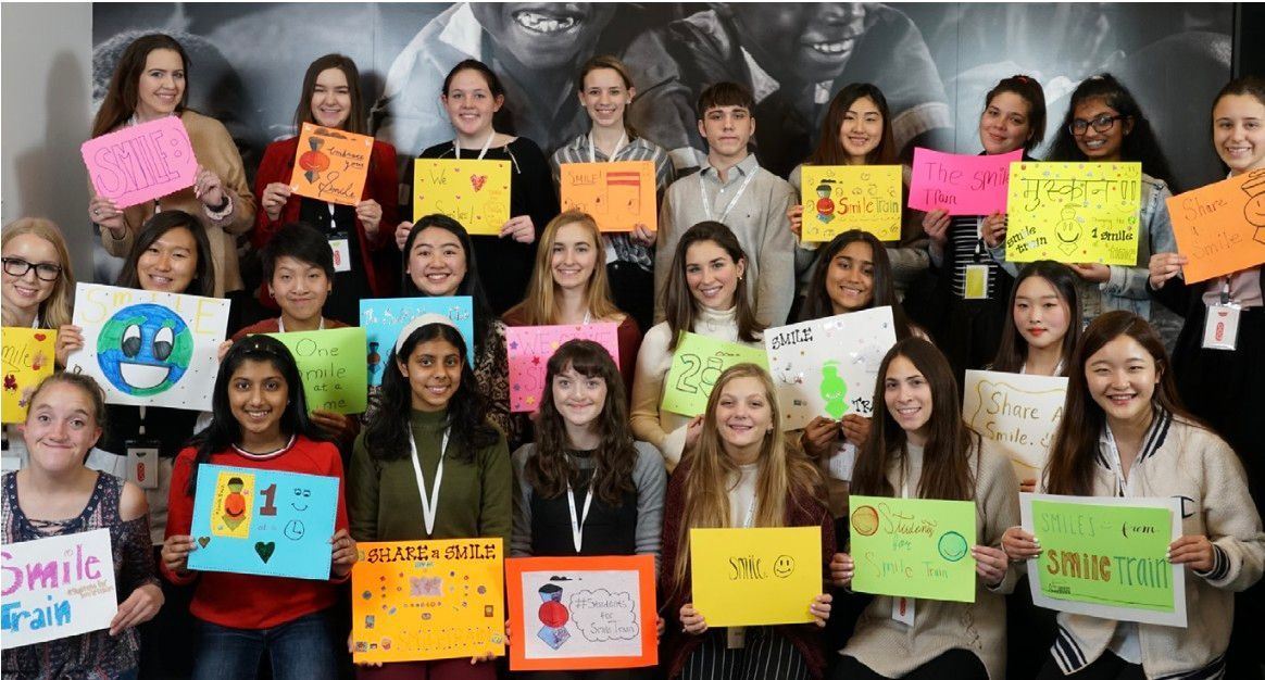 Largest Online Photo Album of Smiling Mouths, world record in Worcester, Massachusetts