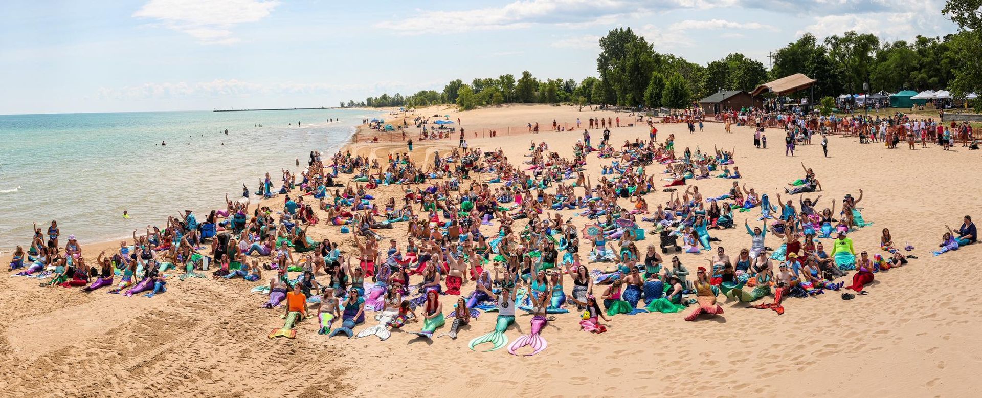 Largest gathering of people dressed as MerPeople, world record in Oscoda, Michigan Largest gathering of people dressed as MerPeople, world record in Oscoda, Michigan