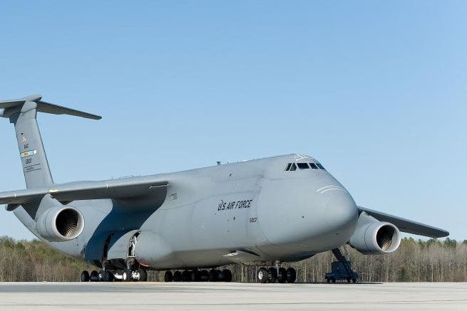 World's largest military transport aircraft, world record set by The Lockheed C-5M Super Galaxy World's largest military transport aircraft, world record set by The Lockheed C-5M Super Galaxy