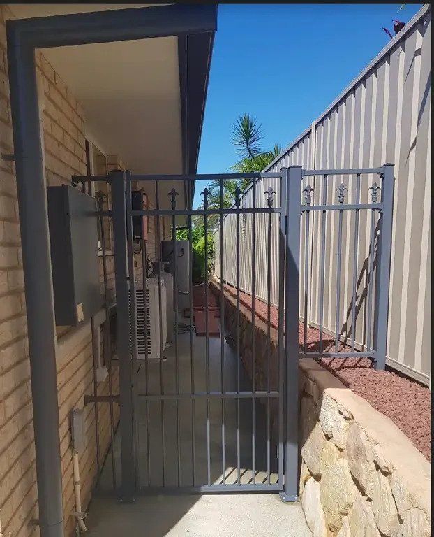 Custom Grey Fencing — Fencing Contractors In Coffs Harbour, NSW