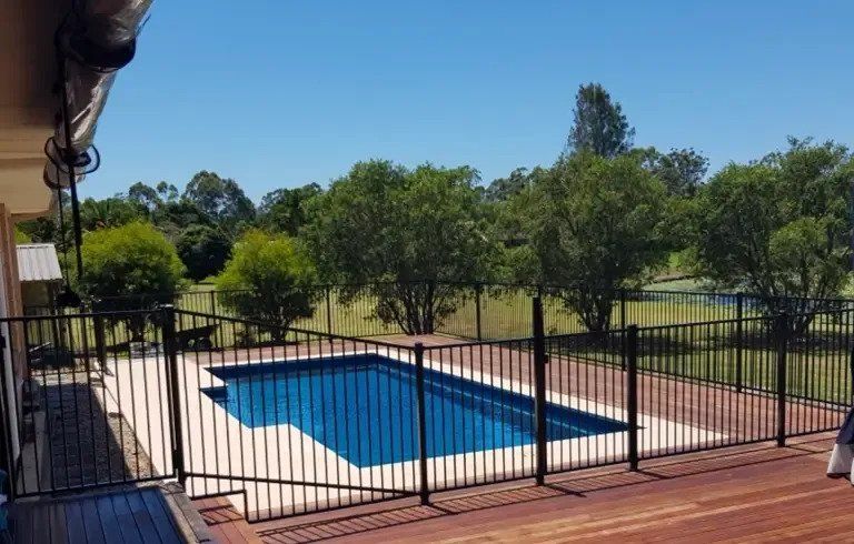 Black Aluminum Pool Fencing — Fencing Contractors In Coffs Harbour, NSW