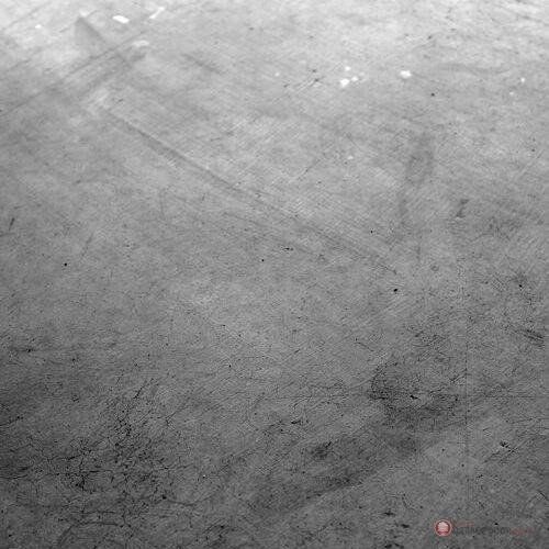 A black and white photo of a concrete floor. garage door floor coating Smart Garage Door Service