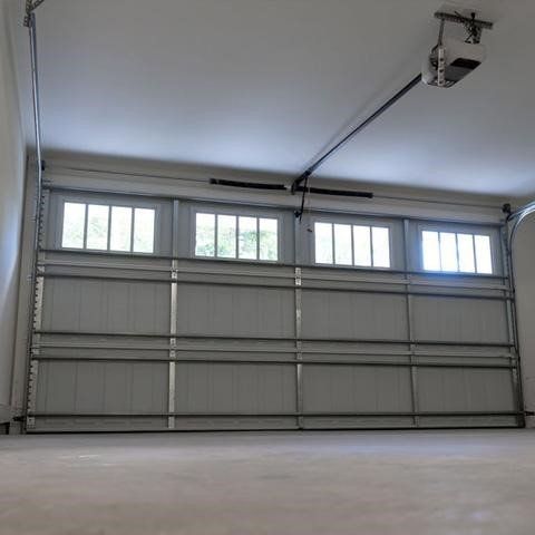 New remote for a garage door internal view of a garage door Smart Garage Door Service