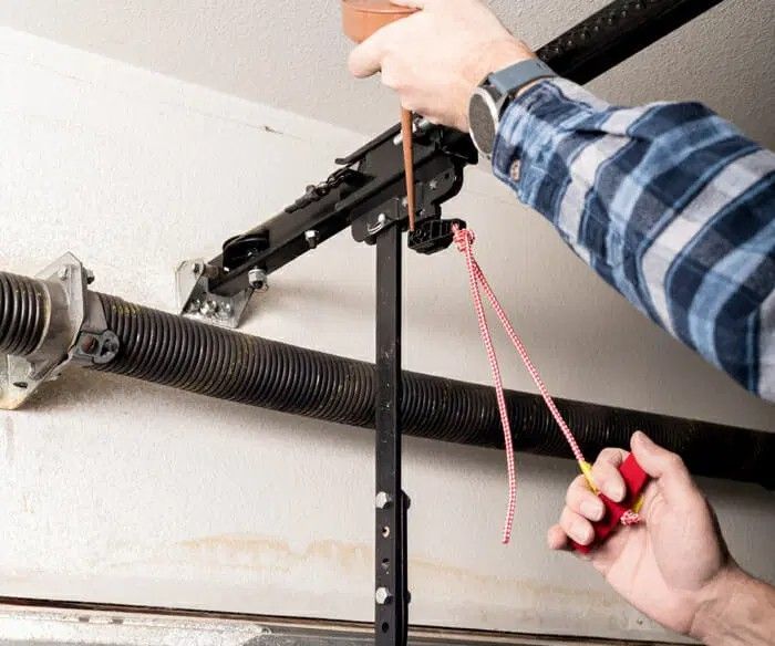 The Dangers of DIY Garage Door Spring Replacement