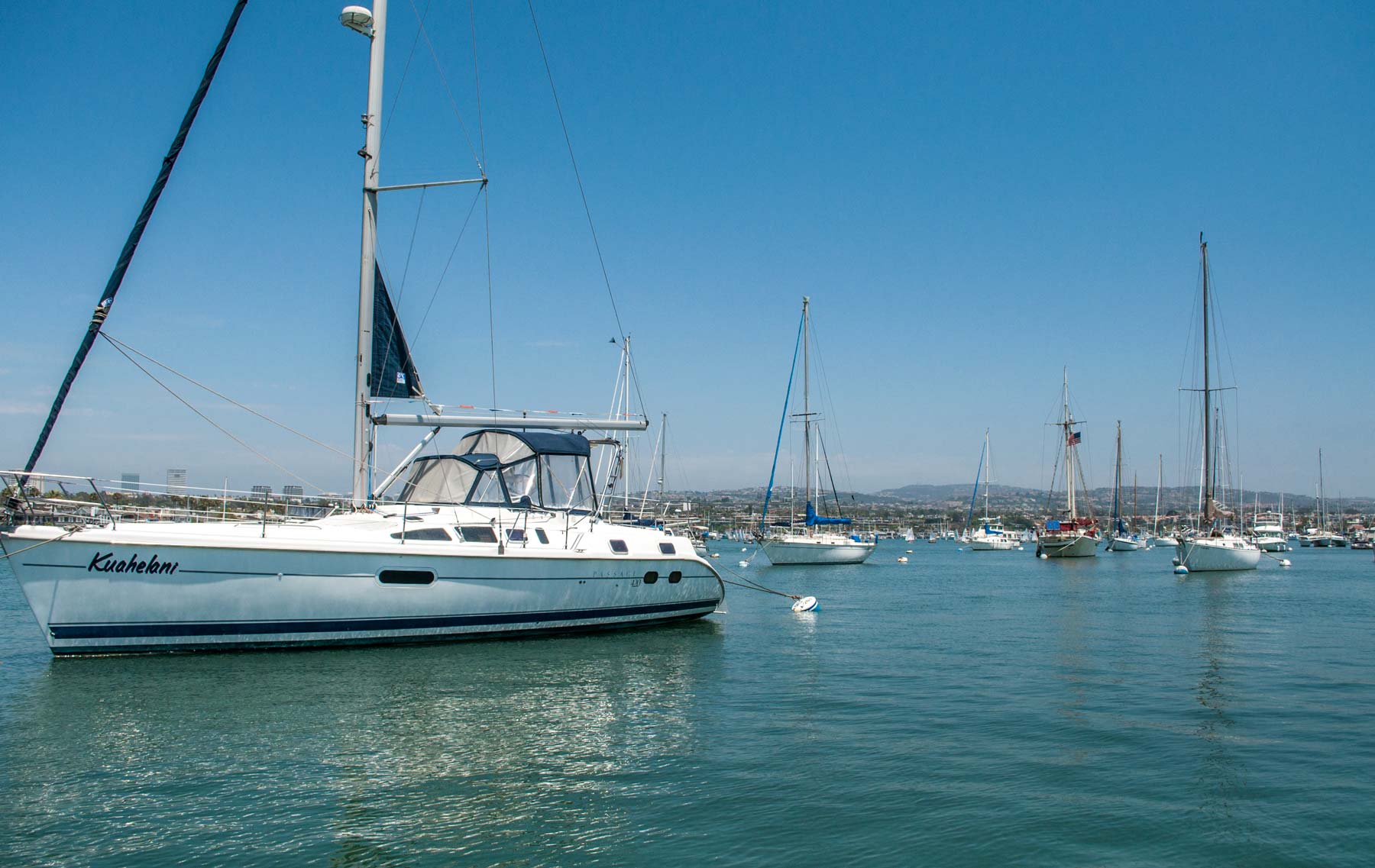 Large sailboat on a mooring in the Newport Beach channel