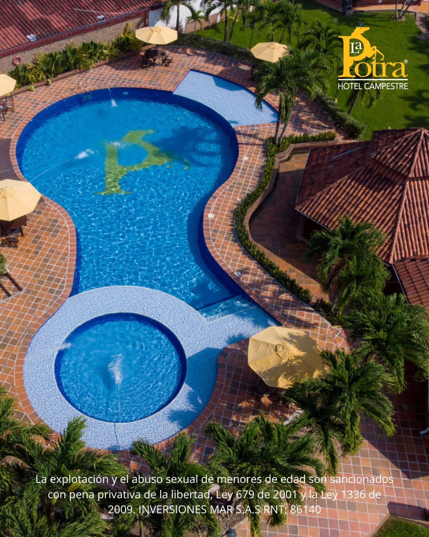 Aerial view of a pool at hotels in Villavicencio with a pool, a relaxing space at La Potra Country Hotel.